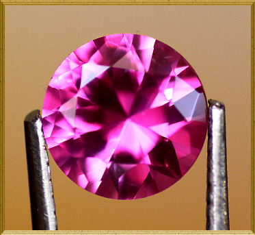 Lab Created Ruby:  Pink Round Brilliant Lab Created Ruby