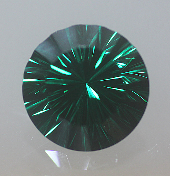 Concave:  Round Emerald Green 