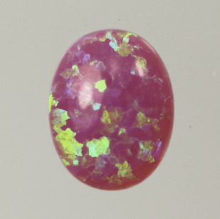 Lab Created Opal:  Oval Cabochon Dark Pink (k-9) Lab Created Opal